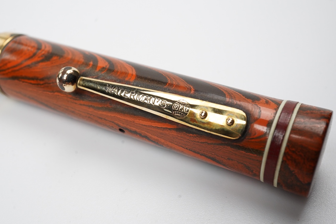 A Waterman Red Ripple No. 5 lever filler with red cap band and fitted with Waterman nib